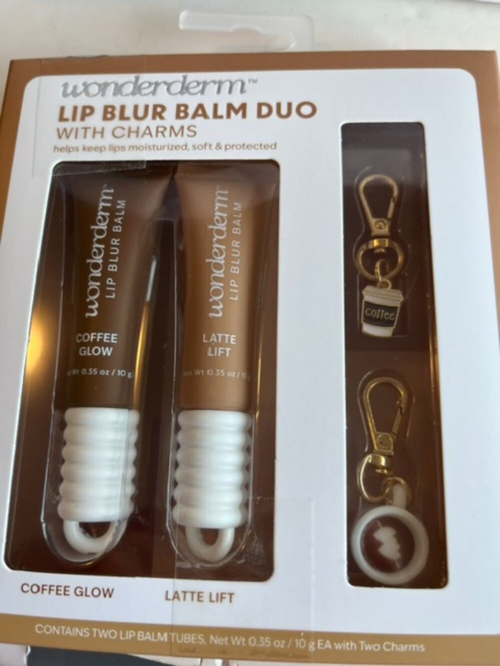 Wonderderm Lip balm duo with charms.